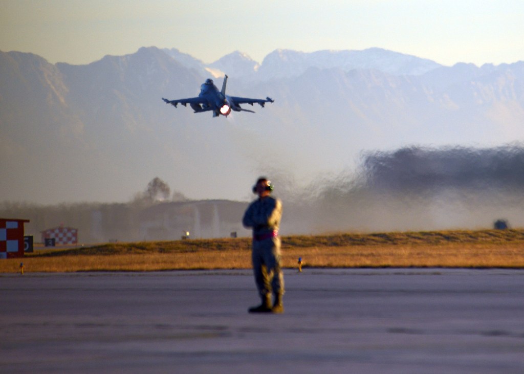 A U.S. Air Force F-16 Fighting Falcon aircraft departs Aviano Air Base, Italy